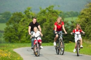 6094221_s-FAMILY-RIDING-BICYCLES-For-Physical-Exercises